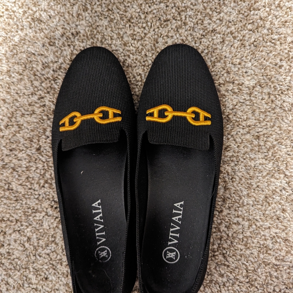 Vivaia black loafers with gold toggle trim